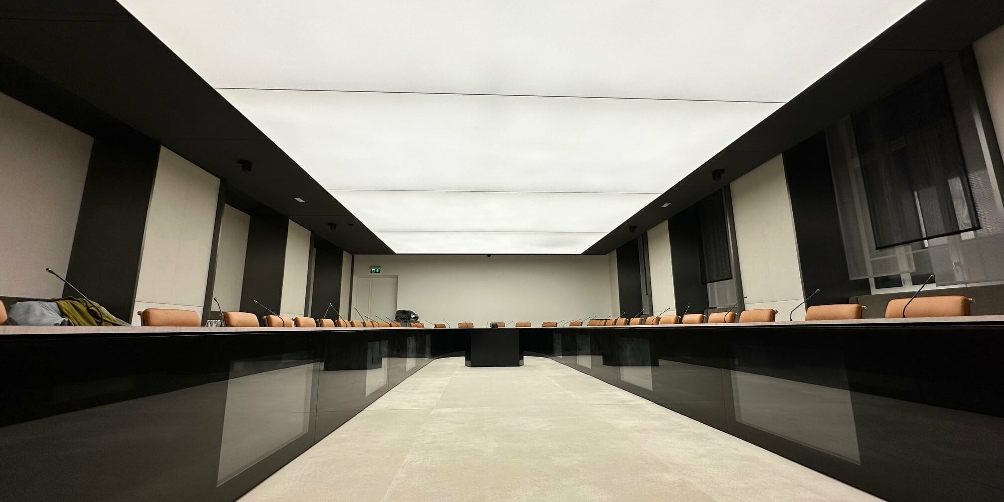backlit stretch ceiling in a meeting room