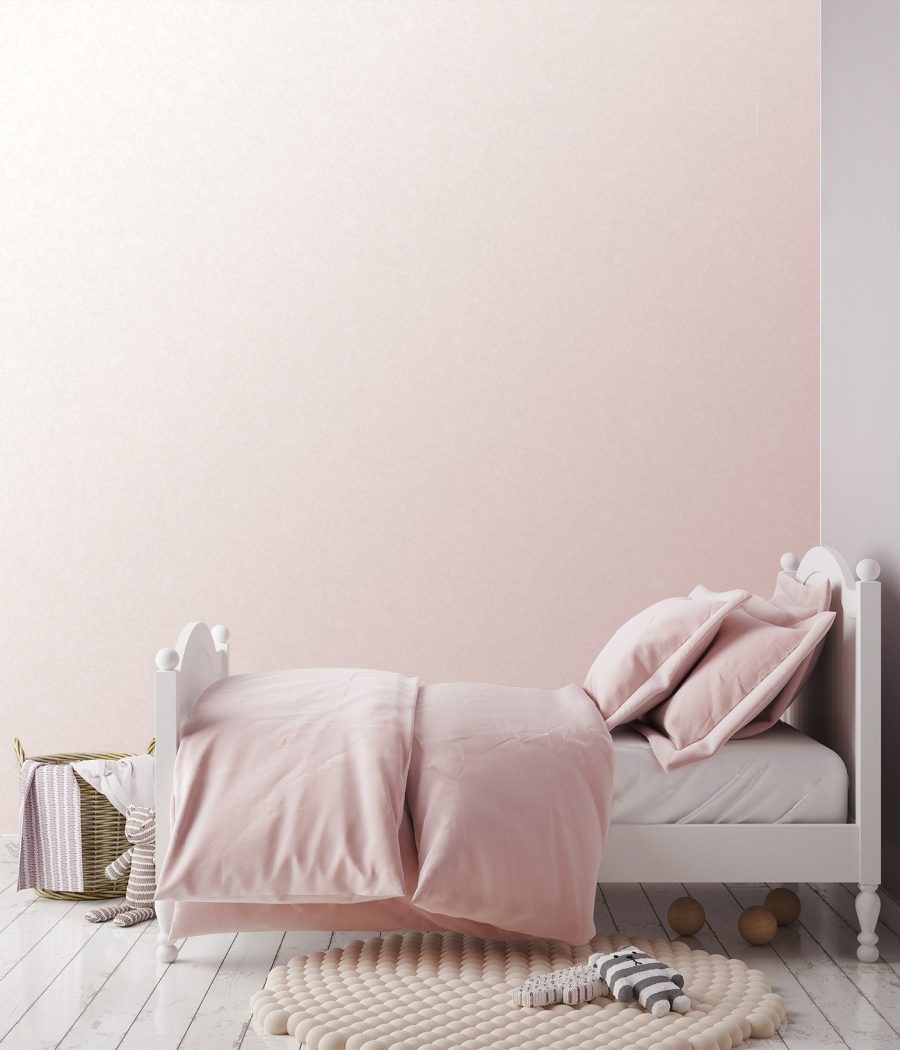 Mur imprimé collection ALYOS design gradient Photo d'un mur imprimé dans une chambre d'enfant sur un revêtement pailleté avec un dégradé de rose